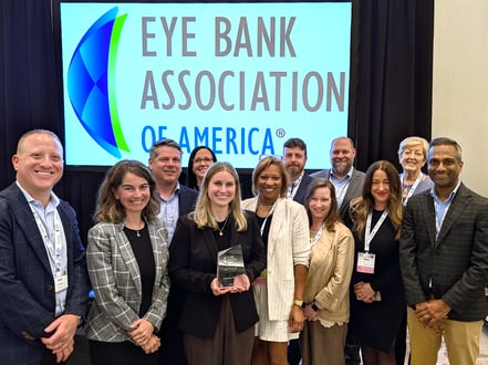 Caroline Miller accepts Optics Award from EBAA