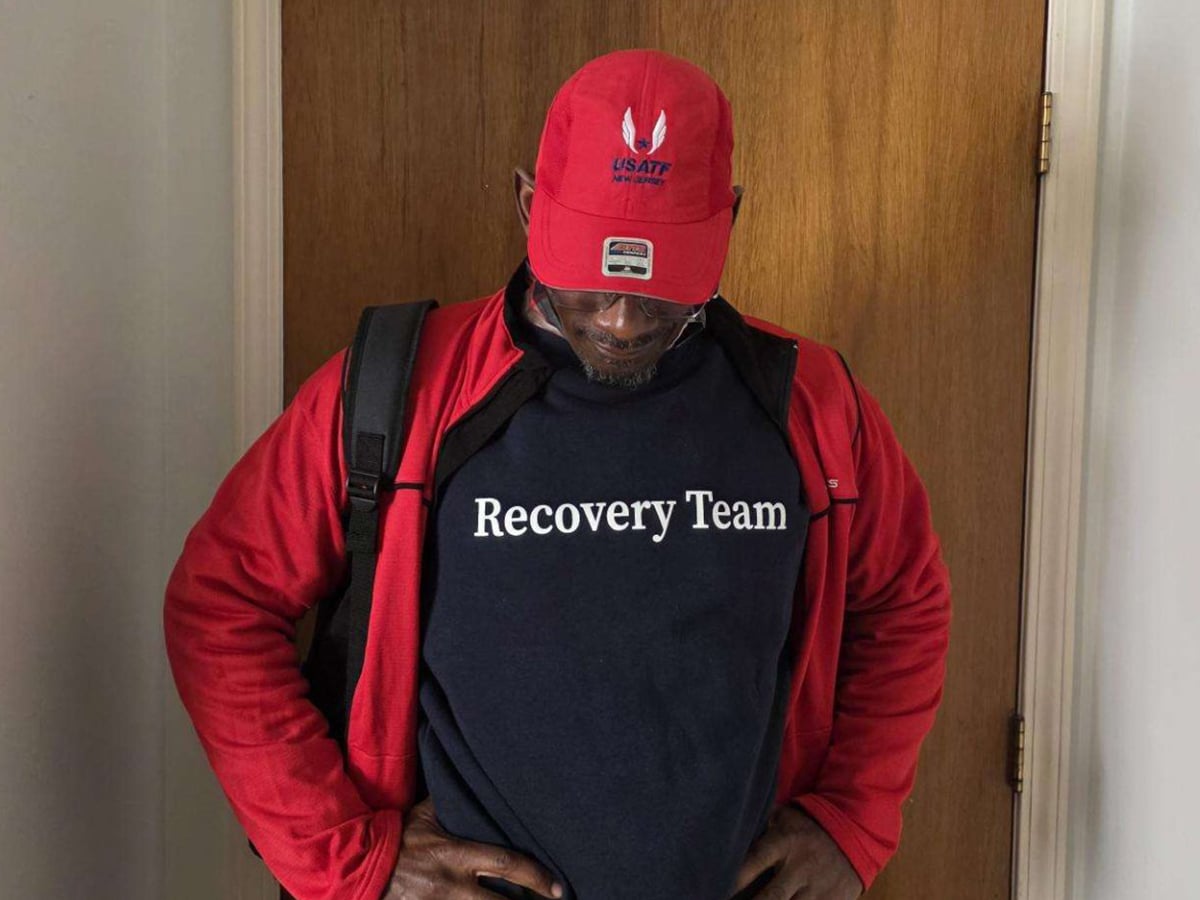Davis Wilson wearing a Recovery Team t-shirt