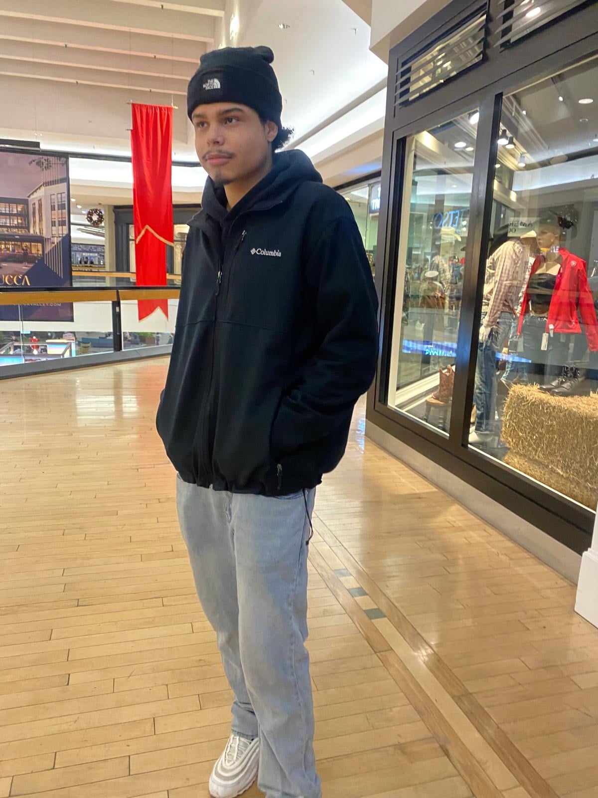 Santiago Villalobos standing in a mall.